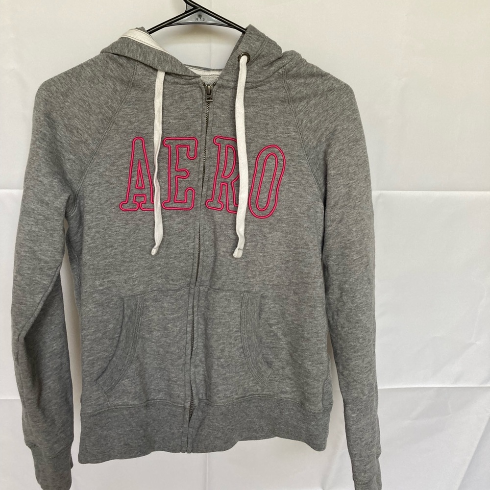 Grey Aeropostale zip up with pink embroidered lettering
